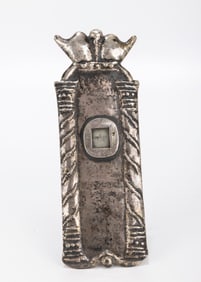 A SILVER MEZUZAH CASE. Probably Poland. Decorated with two pillars and a crown. With the window