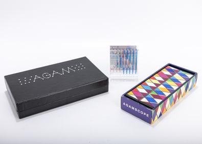 AGAMASCOPE by Yaacov Agam, c. 1990. .Kaleidoscope device with a silkscreen paper. Hand signed and
