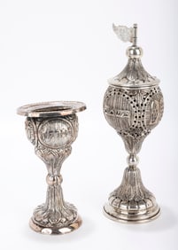 A SILVER HAVDALLAH SET. Hungarian, c. 1920.  Each chased with repousee bodies. Includes a spice