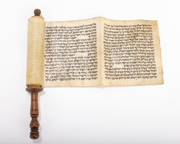 A MEGILLAH ESTHER ON VELLUM WITH ORIGINAL WOOD ROLLER. Ottoman Empire , 19th century. Dark