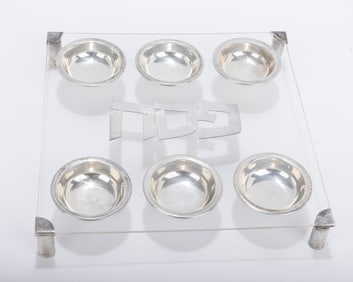 A PLEXIGLASS AND STERLING SILVER SEDER DISH. Probably American, c. 1980. On four feet. With six