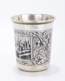 A VERY LARGE NIELLO CUP. Russia, 19th  century. Beaker form. Decorated with town scenes and swirling