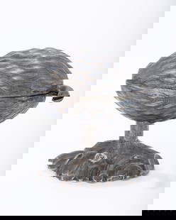 A SILVER ETROG CONTAINER. Germany, c. 1870. On a leafy base with a stem that attaches to the upper: A SILVER ETROG CONTAINER. Germany, c. 1870. On a leafy base with a stem that attaches to the upper portion which is a realistically chased etrog shaped chamber. 5.5" long.