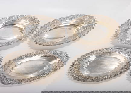 FOUR LARGE STERLING SILVER SERVING DISHES BY KIRK. Hand embossed repousee. Two are 11.5 inches x 8: FOUR LARGE STERLING SILVER SERVING DISHES BY KIRK. Hand embossed repousee. Two are 11.5 inches x 8 inches and two are 12 inches x 7.2 inches. Total weighable silver is 61.16 ozt.