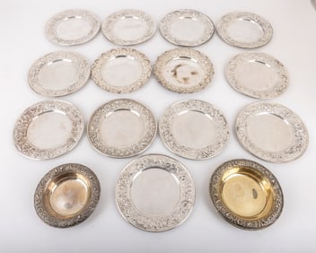 A GROUP OF 15 APPETIZER DISHES BY KIRK. Hand embossed in repousee design. 11 are 6.2 inches wide and