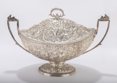 A LARGE STERLING SILVER COVERED TUREEN BY KIRK. Hand embossed in repousee design.  11.5 inches tall