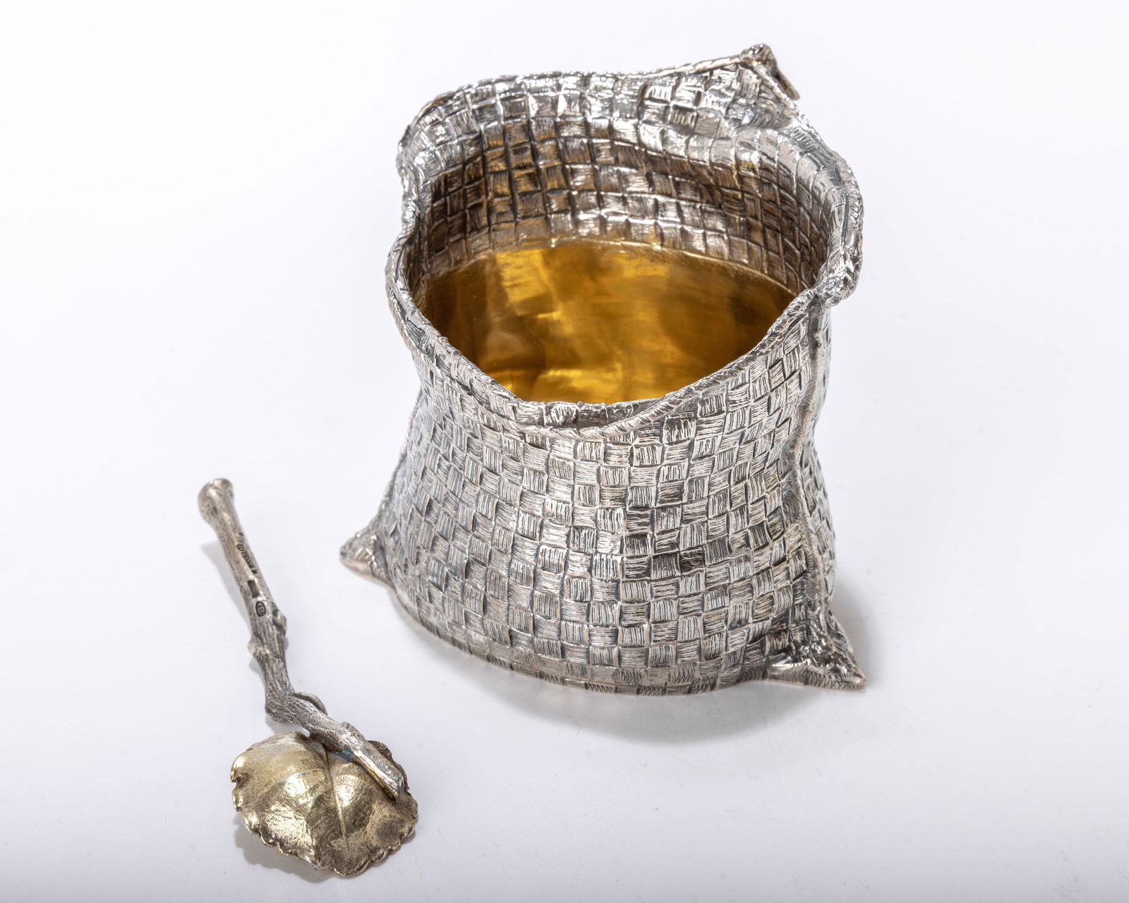 A STERLING SILVER SALT BASKETS BY BUCCELATI. Italy, c. 1970. In the shape of open bags. Hand formed. (1 of 6)