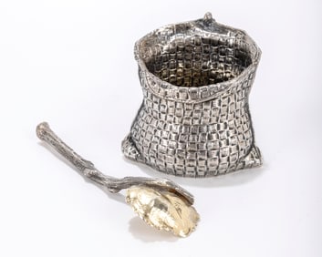 A STERLING SILVER SALT BASKETS BY BUCCELATI. Italy, c. 1970. In the shape of open bags. Hand formed.