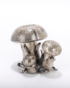 A STERLING SILVER SALT AND PEPPER BY BUCCELATI. Italy, c. 1970. In the form of a cluster of