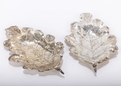 TWO STERLING SILVER LEAF RING DISHES. American, 20th century. In the shape of oak leaves. 2.09 ozt