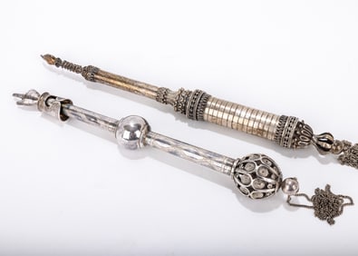 TWO SOLID SILVER TORAH POINTERS. Israel, 20th century. One in an earlier style and one is modern.