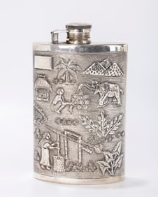 A SILVER FLASK. Probably India, tourist trade, c. 1920. Embossed with period designs. 5.8 inches