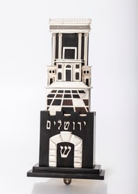 FINE EBONY AND SILVER MEZUZAH BY CATRIEL SUGARMAN. Jerusalem. 1996.Hand made in the form of the