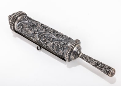 A SILVER MEGILLAH CASE WITH ORIGINAL MEGILLAH. Israel, c. 1980. Hand chased with flowing designs.