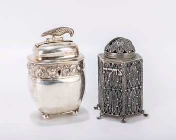 TWO SILVER CHARITY CONTAINERS. The first, modern filigree, Israel, the second German, c. 1880. Each