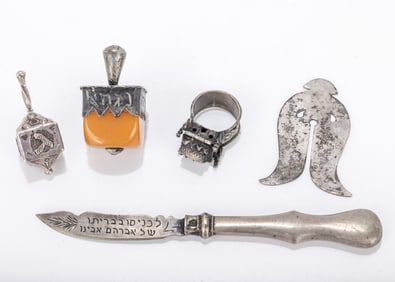A GROUP OF ASSORTED SMALL SILVER JUDAICA. Including dreidels, a ring, a knife and others. Various