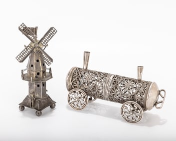 TWO SILVER SPICE CONTAINERS. Including a locomotive and windmill.