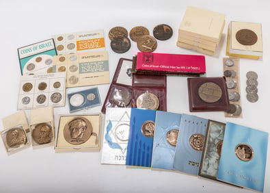 A COLLECTION OF ISRAELI COINS AND JUDAIC MEDALS. Composed of brass and silver medals and coin sets