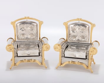 A PAIR OF SOFA FORM SABBATH CANDLESTICKS BY SWED MASTER SILVERSMITHS. Jerusalem, late 1990â€
