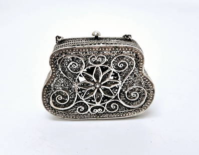 A SILVER FILIGREE PURSE SHAPED SPICE CONTAINER. Russia, c. 1890.: A SILVER FILIGREE PURSE SHAPED SPICE CONTAINER. Russia, c. 1890. In the shape of a purse. Marked 84. 2.8" wide.