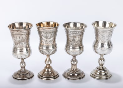 A GROUP OF FOUR RUSSIAN SILVER KIDDUSH GOBLETS. 19th century. Each one a round base with a knobbed