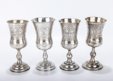 A GROUP OF FOUR RUSSIAN SILVER KIDDUSH GOBLETS. 19th century. Each one a round base with a knobbed