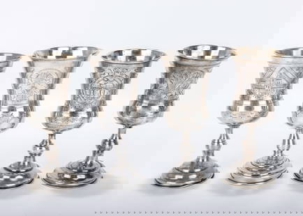 A GROUP OF FOUR RUSSIAN SILVER KIDDUSH GOBLETS. 19th century. Each one a round base with a knobbed: A GROUP OF FOUR RUSSIAN SILVER KIDDUSH GOBLETS. 19th century. Each one a round base with a knobbed stem and an outward tapering wine portion. Marked. 5.2 inches tall each. Total weight is 349 grams.