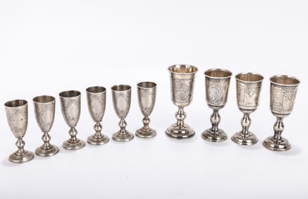 A GROUP OF TEN SILVER KIDDUSH GOBLETS. Russia, late 19th/early 20th centuries. Consisting of four