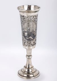 A SILVER AND NIELLO CHAMPAGNE FLUTE. Russia, c. 1860. On a round base with a highly decorated upper
