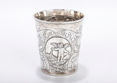 A LARGE 18TH CENTURY SILVER BEAKER. Probably Moscow. Highly decorated with a cherub and unicorn  72