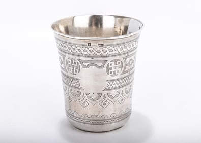 A LARGE RUSSIAN SILVER BEAKER. Russia, 1882. Highly engraved with geometrical and flowing designs.
