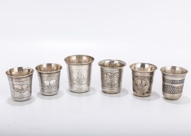 A GROUP OF SIX SILVER RUSSIAN KIDDUSH BEAKERS. Russia, varying 19th century dates. Each hand
