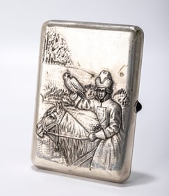 A RUSSIAN SILVER EMBOSSED CIGARETTE CASE. Russia, c. 1910. Skillfully decorated with a hunter on his