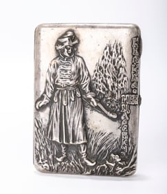 A RARE RUSSIAN SILVER AND GOLD CIGARETTE CASE . A RARE RUSSIAN EMBOSSED SILVER CIGARETTE BOX.