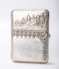 A RARE RUSSIAN EMBOSSED SILVER CIGARETTE CASE . Moscow, 1908 - 1926. Embossed with a medieval castle