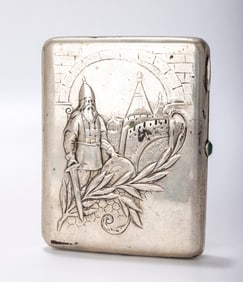A RARE RUSSIAN EMBOSSED SILVER CIGARETTE CASE. Moscow, 1908 - 1926. Embossed with a viking warrior