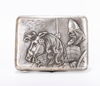 A RUSSIAN EMBOSSED SILVER CIGARETTE CASE . Early Soviet period. Embossed with a viking or warrior