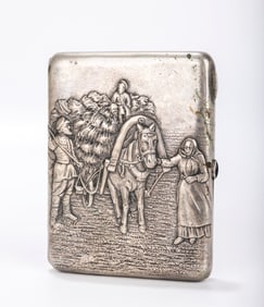 A RUSSIAN EMBOSSED SILVER CIGARETTE CASE . Early Soviet period. Embossed on one side is a village