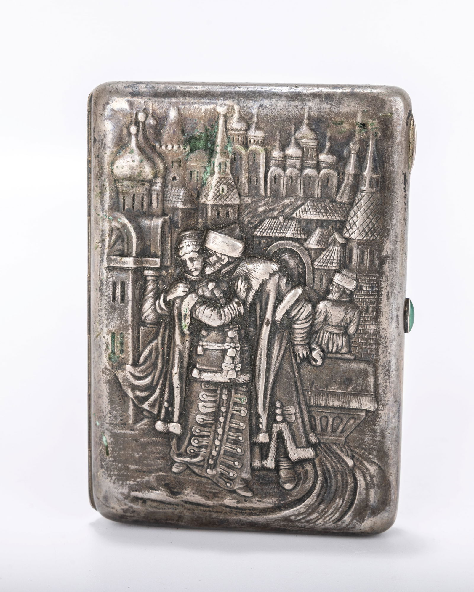 A RARE RUSSIAN EMBOSSED SILVER CIGARETTE CASE. Moscow, 1908 - 1926. Embossed with a city scene with (1 of 8)