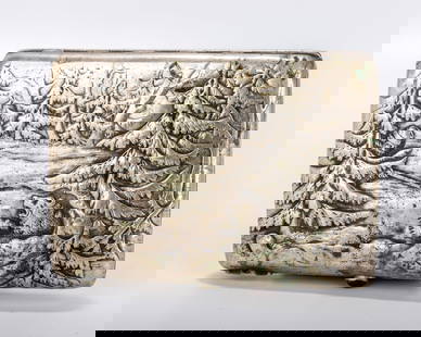A RARE RUSSIAN EMBOSSED SILVER CIGARETTE CASE. Moscow, 1898 - 1914. Embossed with a hunting scene of: A RARE RUSSIAN EMBOSSED SILVER CIGARETTE CASE. Moscow, 1898 - 1914. Embossed with a hunting scene of a man shooting a bear in the forest. Engraved cyrillic dedication on the verso. Marked with Kokoshn