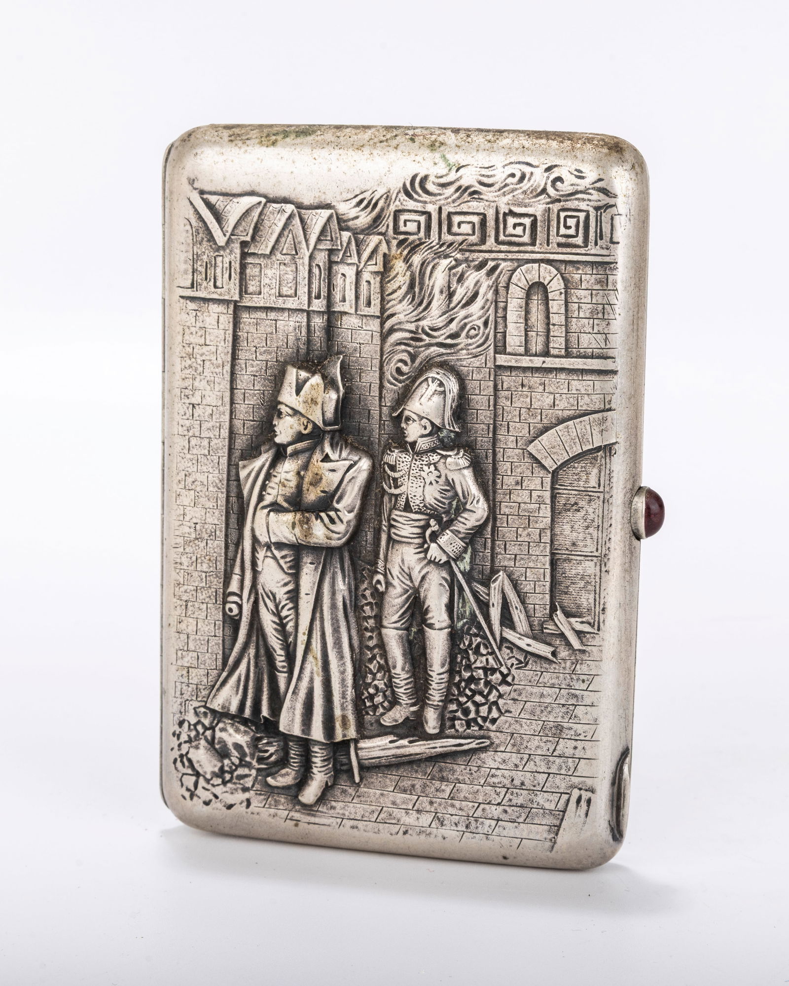 A RARE RUSSIAN EMBOSSED SILVER CIGARETTE CASE. Moscow, 1908 - 1926. Embossed with two military (1 of 9)