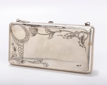 AN ART NOUVEAU SILVER LADIES PURSE. Russian, c. 1920. Bright cut engraved with flowing designs and