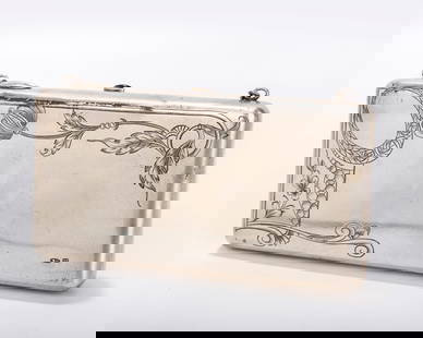 AN ART NOUVEAU SILVER LADIES PURSE. Russian, c. 1920. Bright cut engraved with flowing designs and: AN ART NOUVEAU SILVER LADIES PURSE. Russian, c. 1920. Bright cut engraved with flowing designs and leaf structures. With the original chain. 5.7" x 3.2" and 296 grams.