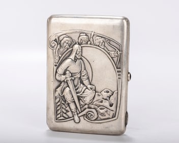 A RARE RUSSIAN EMBOSSED SILVER CIGARETTE CASE. Moscow, 1908 - 1926. Embossed  a swordsman sitting on