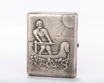 A RUSSIAN EMBOSSED SILVER CIGARETTE CASE. Moscow, Early Soviet period. Decorated with a bearded