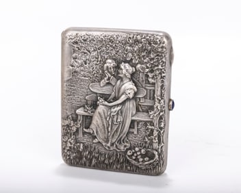 A RARE RUSSIAN EMBOSSED SILVER CIGARETTE CASE. Moscow, 1908 - 1926. Embossed with young lovers with