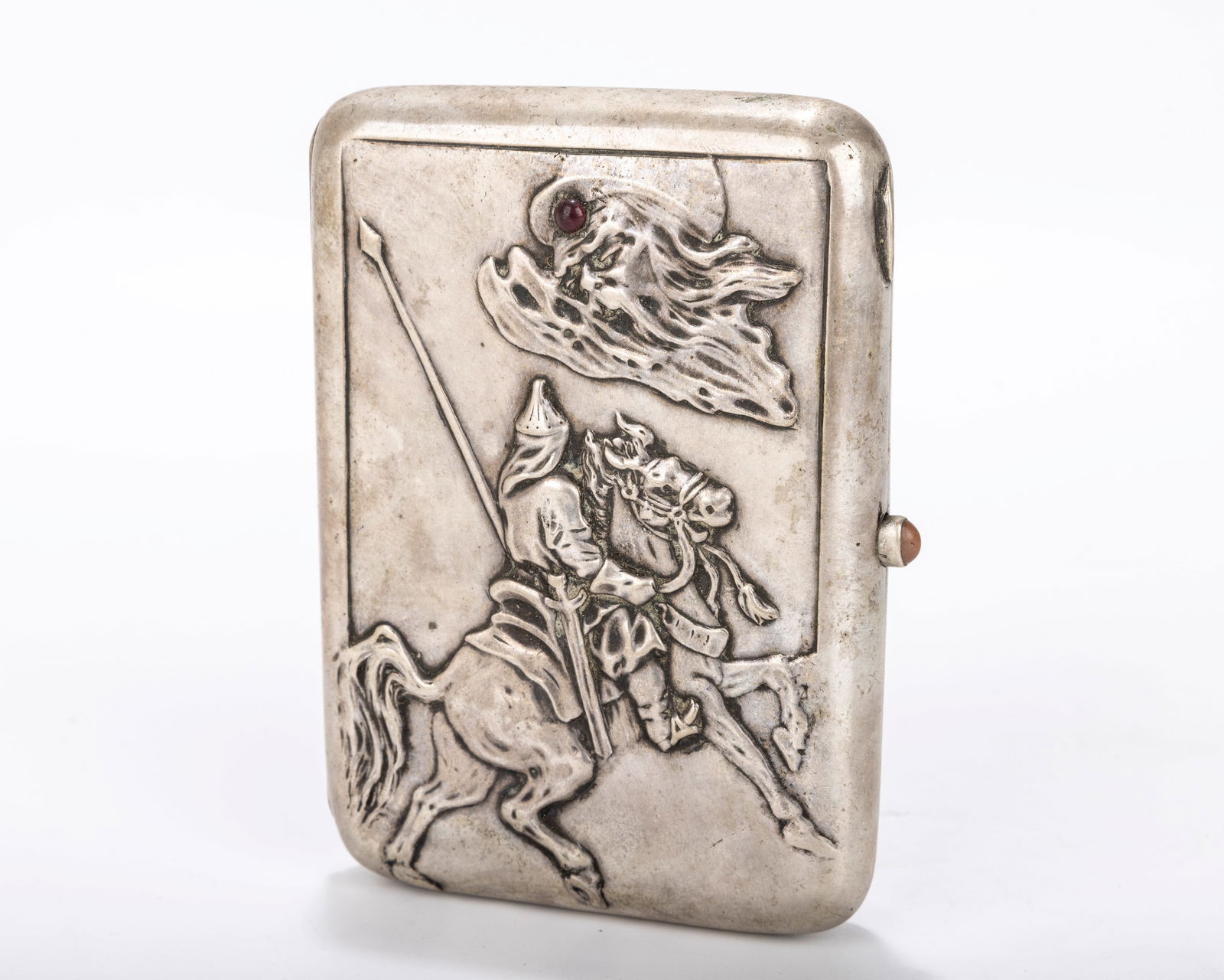 A RARE RUSSIAN EMBOSSED SILVER CIGARETTE CASE. Moscow, 1898 - 1914. Embossed with a scene of a (1 of 9)