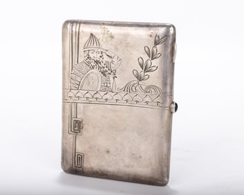 A RARE RUSSIAN SILVER CIGARETTE CASE. Moscow, 1908 - 1926. Engraved with a viking and organic