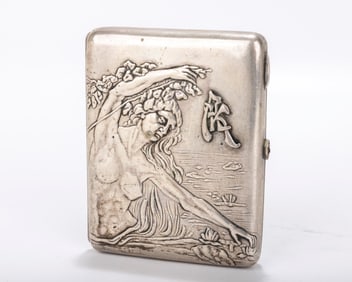 A RARE RUSSIAN EMBOSSED SILVER CIGARETTE CASE. Moscow, 1908 - 1926. Embossed with a mermaid arising
