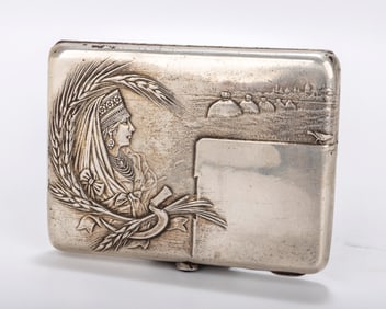 A RARE RUSSIAN EMBOSSED SILVER CIGARETTE CASE. Moscow, 1908 - 1926. Embossed with a jeweled woman,